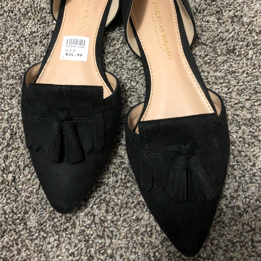 Black flats with tassel detail